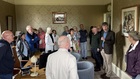 Stephen Moore with group in the principal's office